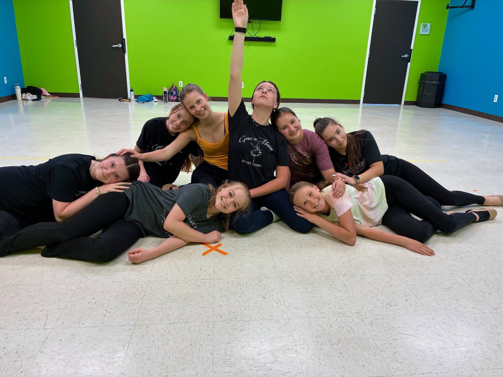 Group of teen dancers posing together