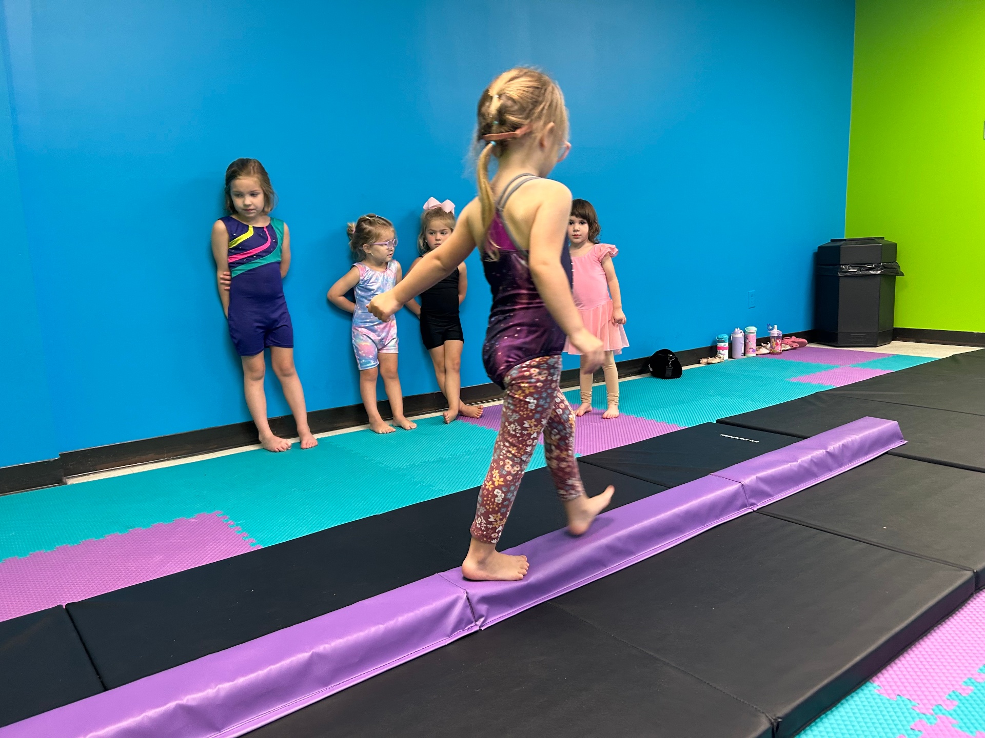 Dancer walking the balance beam